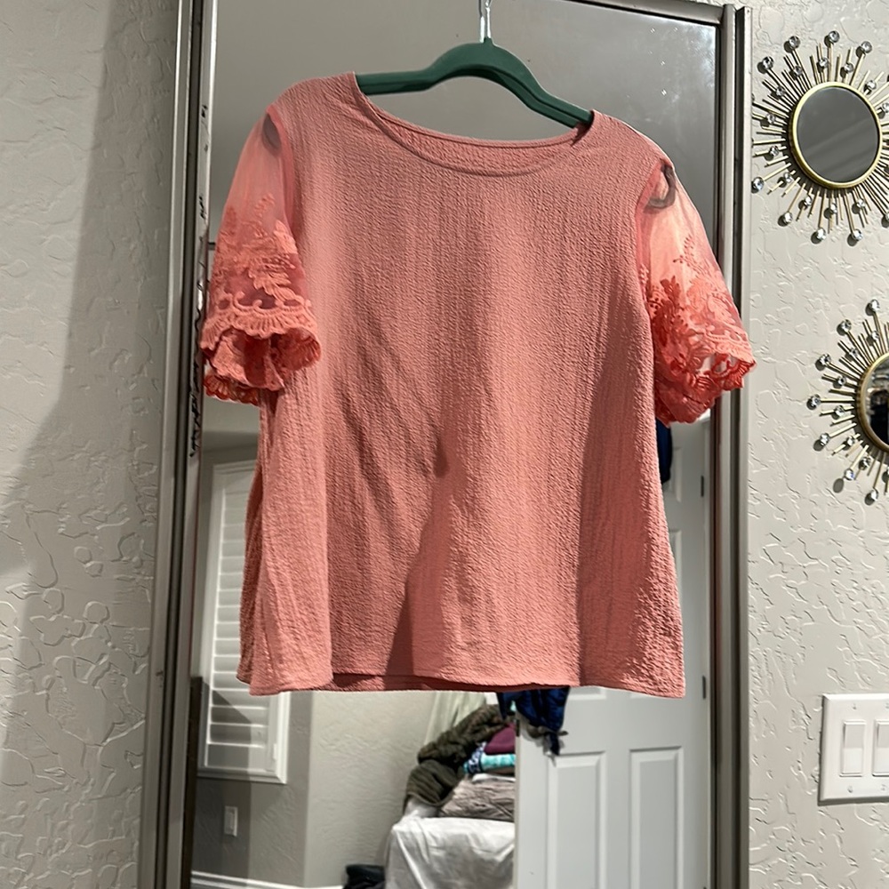 Pink/ salmon colored blouse, size Large in woman,
